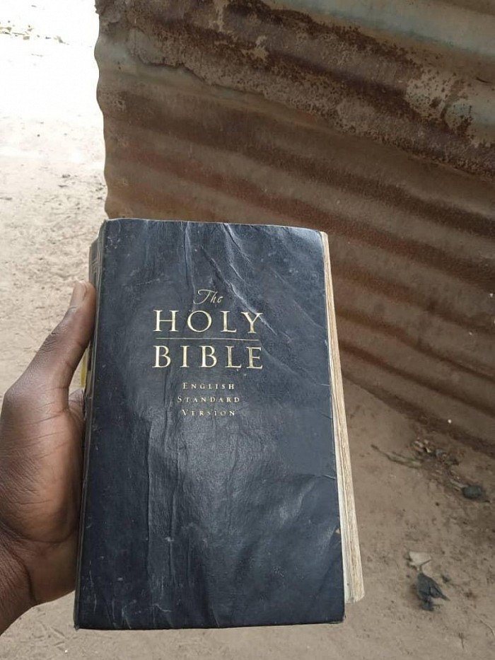 My Muslim friend teaching me thru my own Bible I mailed to him.                     From Gambia, birkima